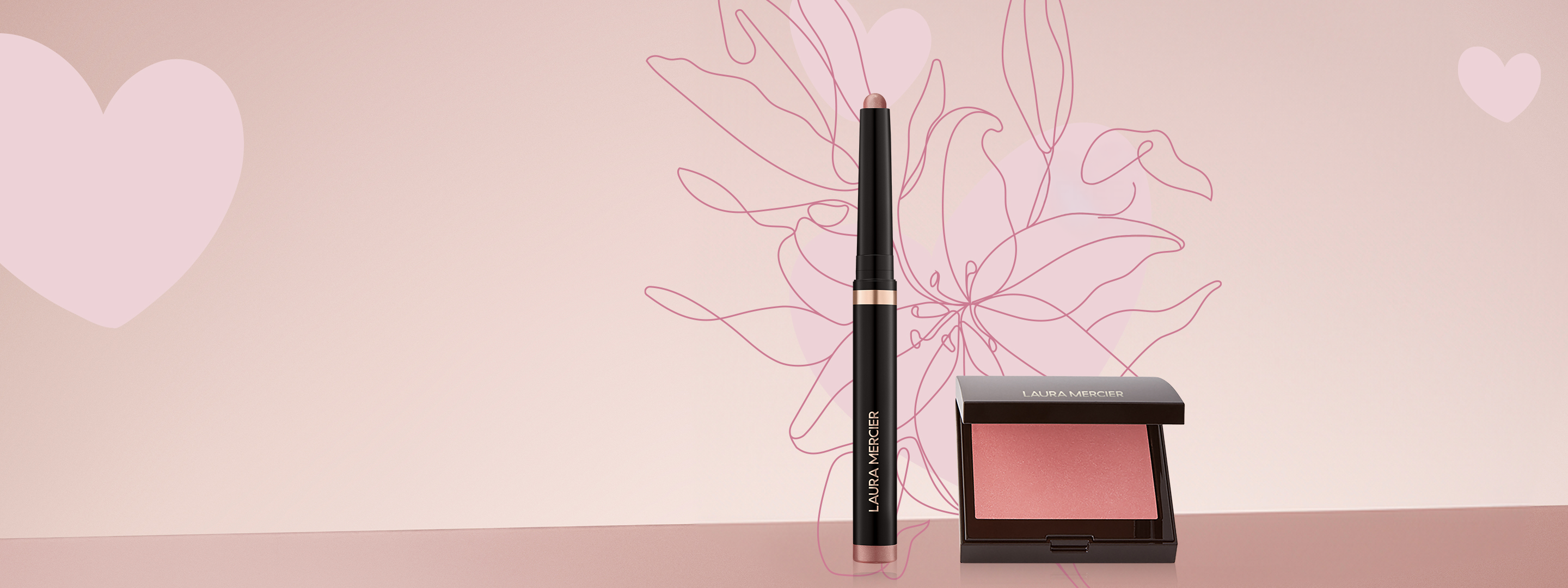 Laura Mercier RoseGlow Caviar Stick Eye Shadow next to Blush Color Infusion with a pink backgrounds and some hearts